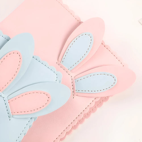 Cute bunny style mini photo album in pink, blue, or white with 16 loose-leaf pages for 3-inch photos.