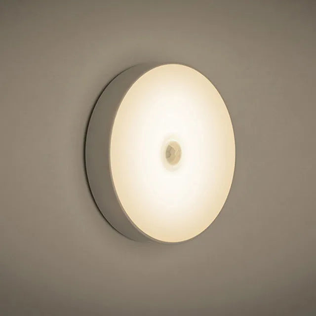 USB rechargeable motion sensor LED night light with 86mm diameter in beige or white