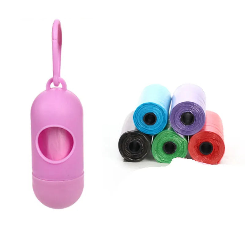 Roll of multi-coloured dog waste bags showing black, blue, green, and pink examples