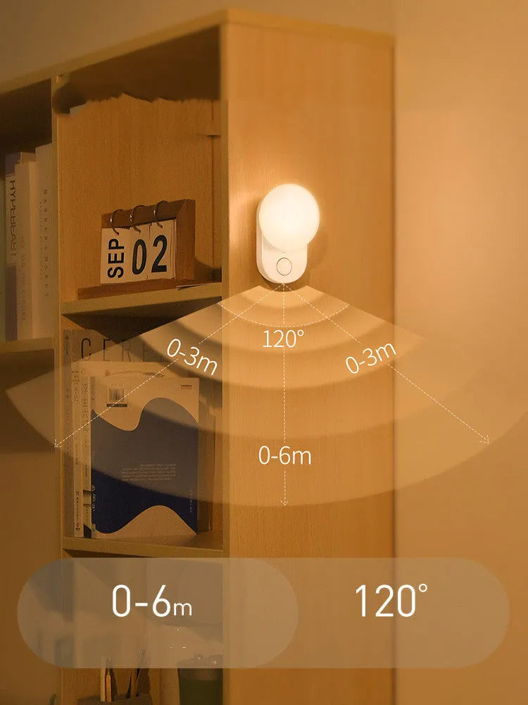 White Baseus rechargeable sensor night light with LED glow, shown on a surface.