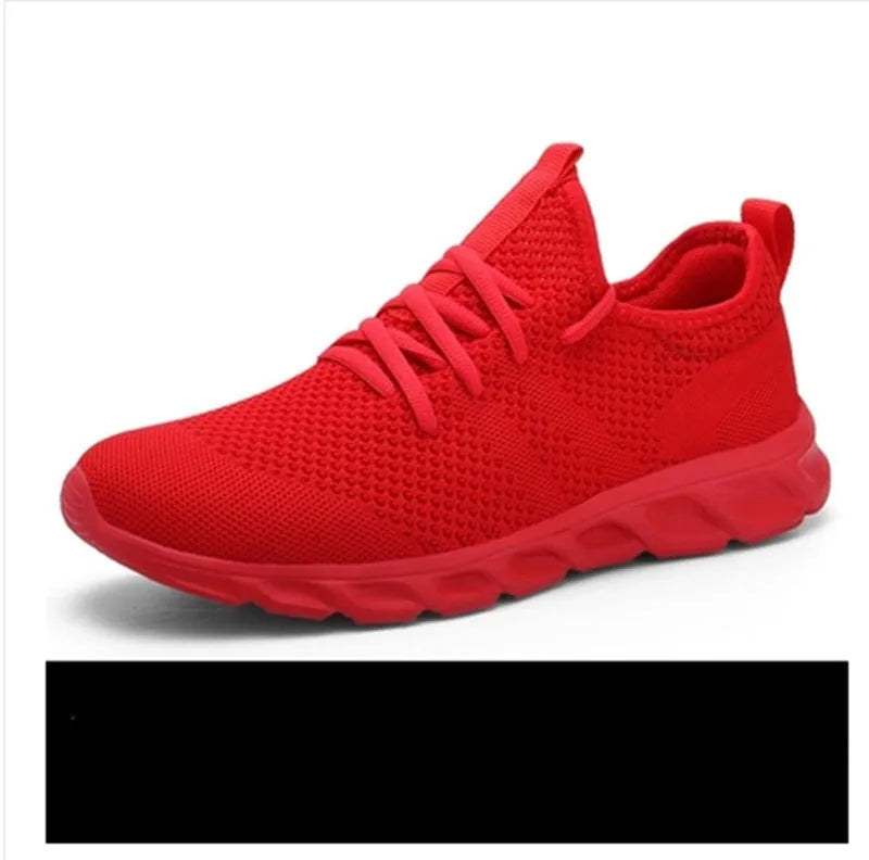 Men's black and white lace-up sport shoes with mesh upper and PVC sole for casual jogging.