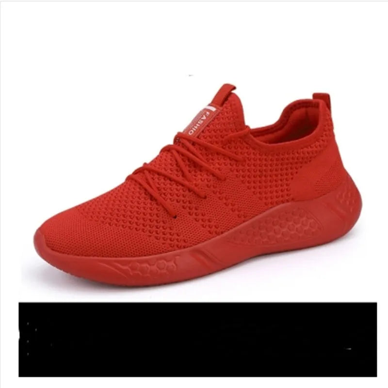 Men's black and white lace-up sport shoes with mesh upper and PVC sole for casual jogging.