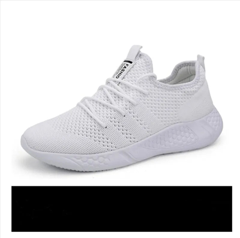 Men's black and white lace-up sport shoes with mesh upper and PVC sole for casual jogging.