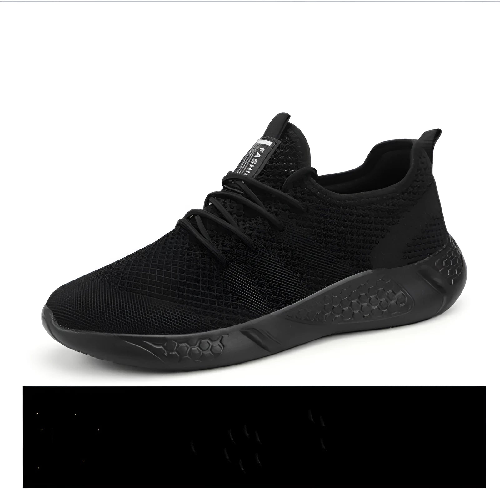 Men's black and white lace-up sport shoes with mesh upper and PVC sole for casual jogging.