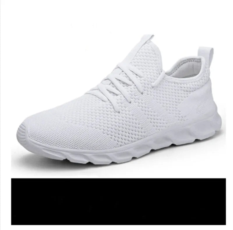 Men's black and white lace-up sport shoes with mesh upper and PVC sole for casual jogging.