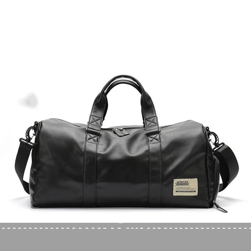 Large black PU leather sports training bag with a shoulder strap, shown with internal organiser pockets for a laptop and camera.