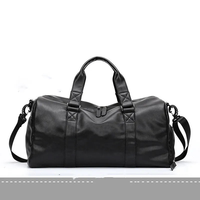 Large black PU leather sports training bag with a shoulder strap, shown with internal organiser pockets for a laptop and camera.