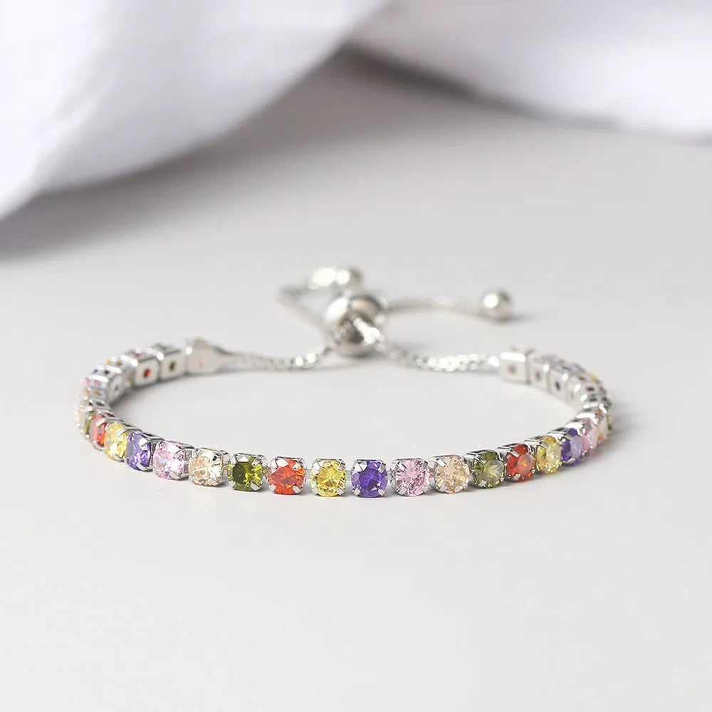 Round zircon single row tennis bracelet in copper with inlaid white stones, rose gold tone