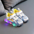 Kids sneakers with mesh upper and Velcro straps in black, grey or pink colours