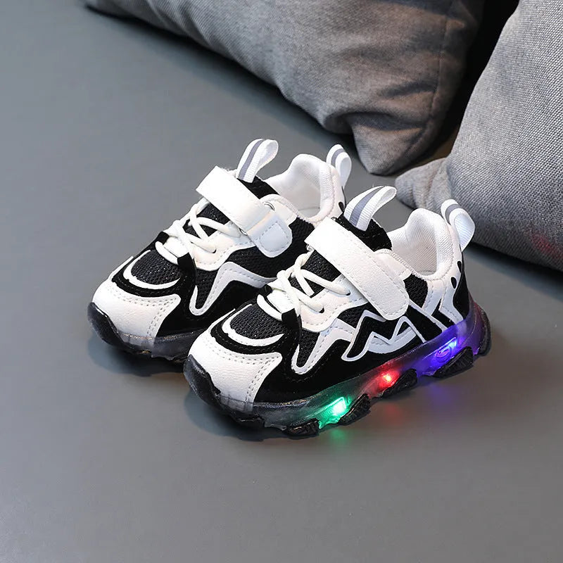 Kids sneakers with mesh upper and Velcro straps in black, grey or pink colours