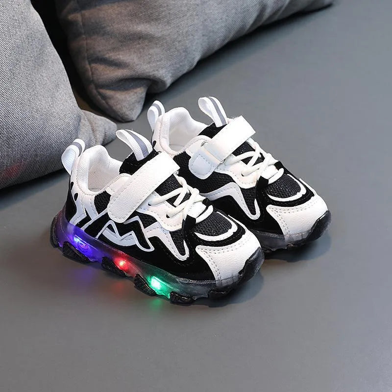 Kids sneakers with mesh upper and Velcro straps in black, grey or pink colours