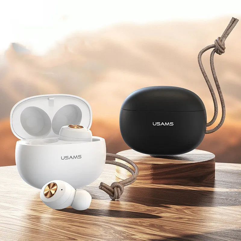 Wireless Bluetooth mini TWS earbuds and charging case in black, white, or green.