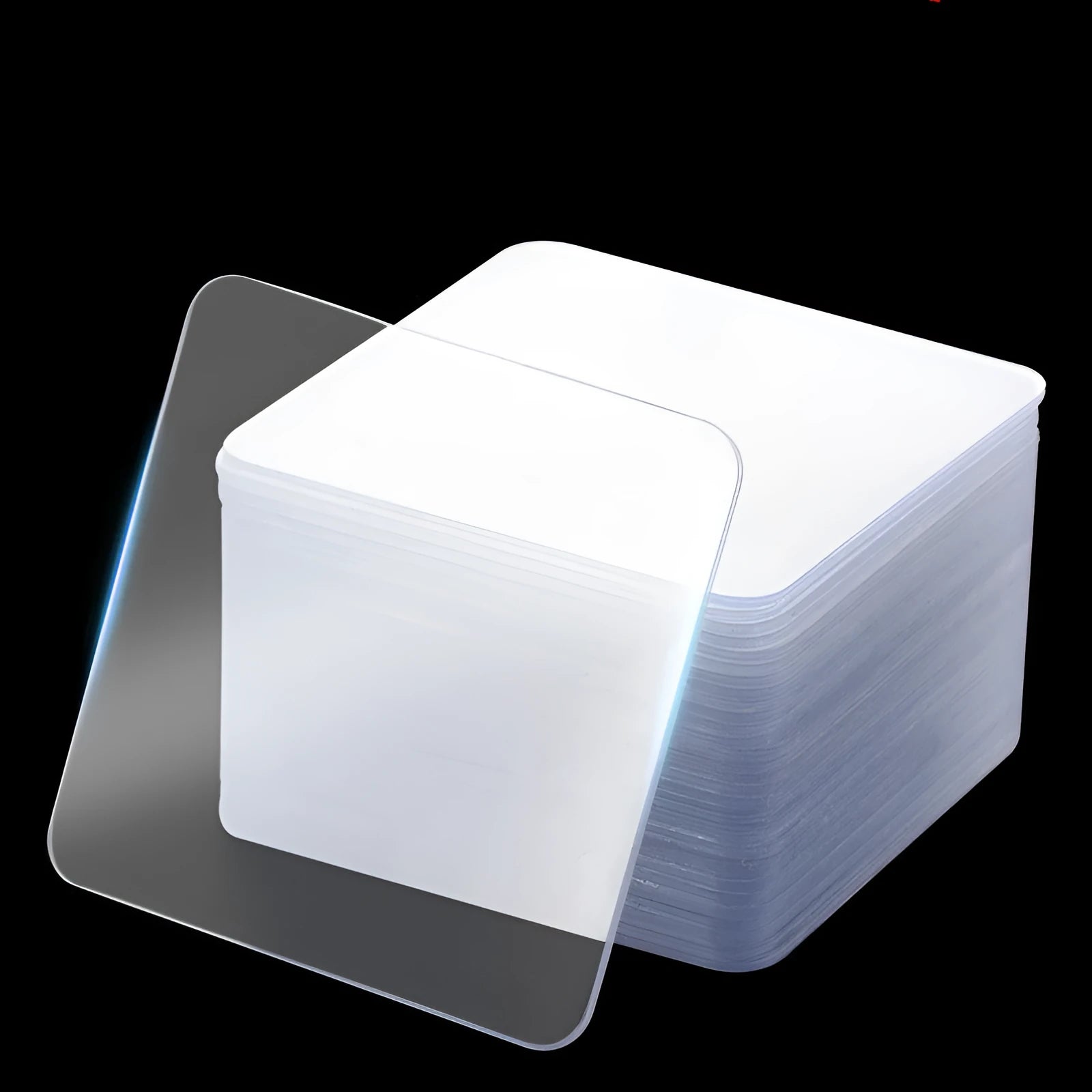 Pack of 10 transparent nano double-sided adhesive stickers, each 6cm square, on a white background