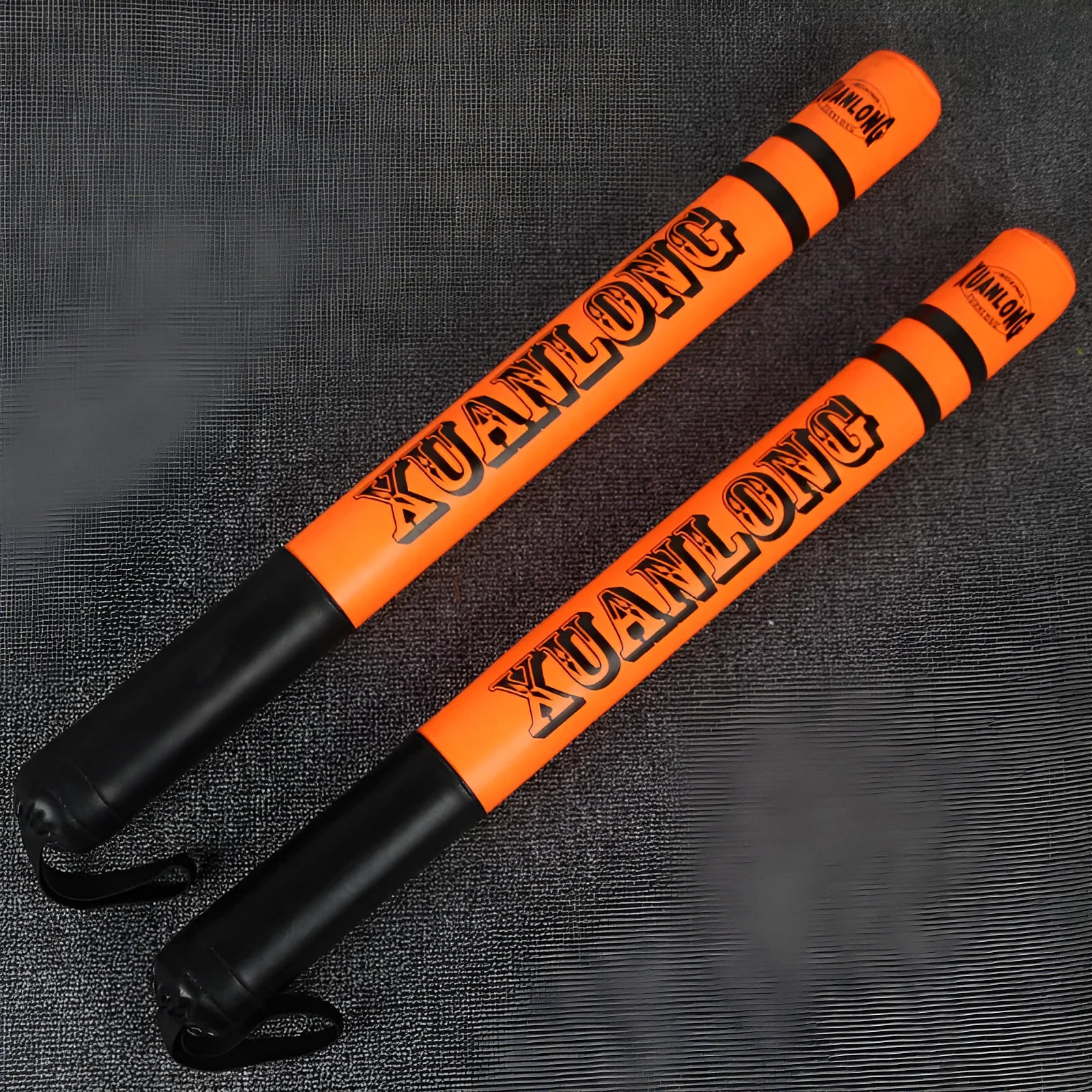 Pair of 57cm boxing target sticks in orange and green with PU and foam construction for reaction training