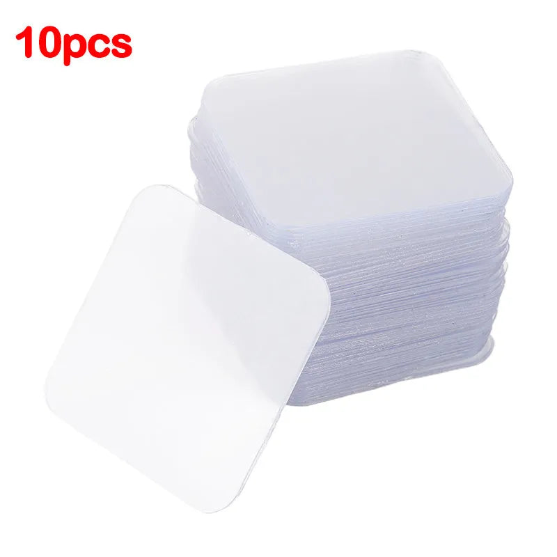 Pack of 10 transparent nano double-sided adhesive stickers, each 6cm square, on a white background