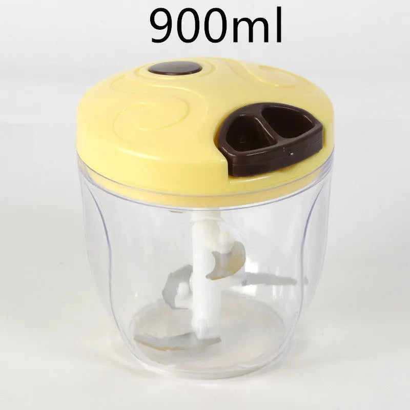 Green manual kitchen chopper with three blades, measuring approximately 13cm long