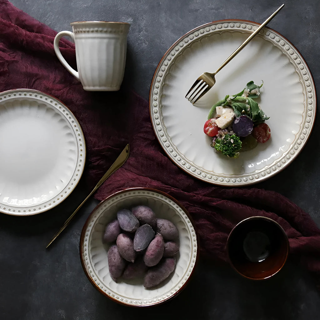 Set of five relief ceramic stoneware plates in retro European design with kiln change relief texture, available in colours C1 to C5