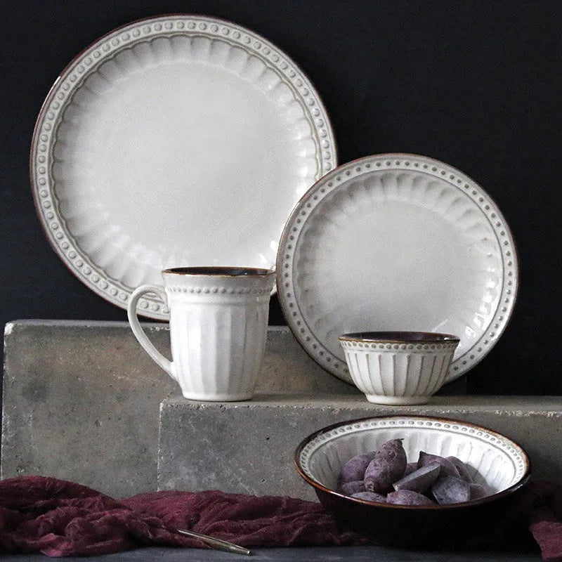 Set of five relief ceramic stoneware plates in retro European design with kiln change relief texture, available in colours C1 to C5