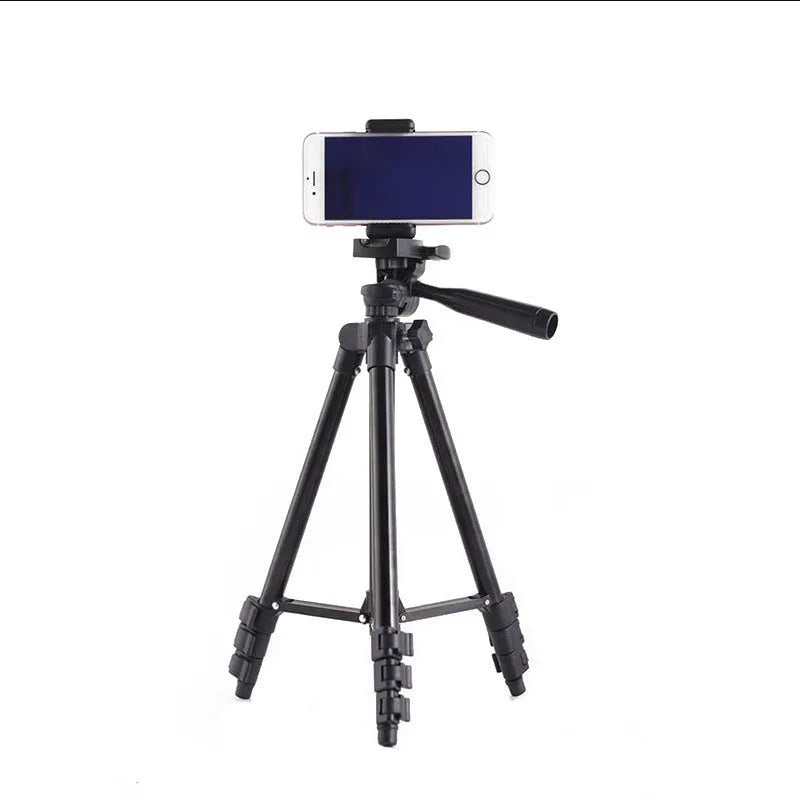 Black aluminium portable camera tripod with 4-section legs and a 3D pan head, shown at mid-height.