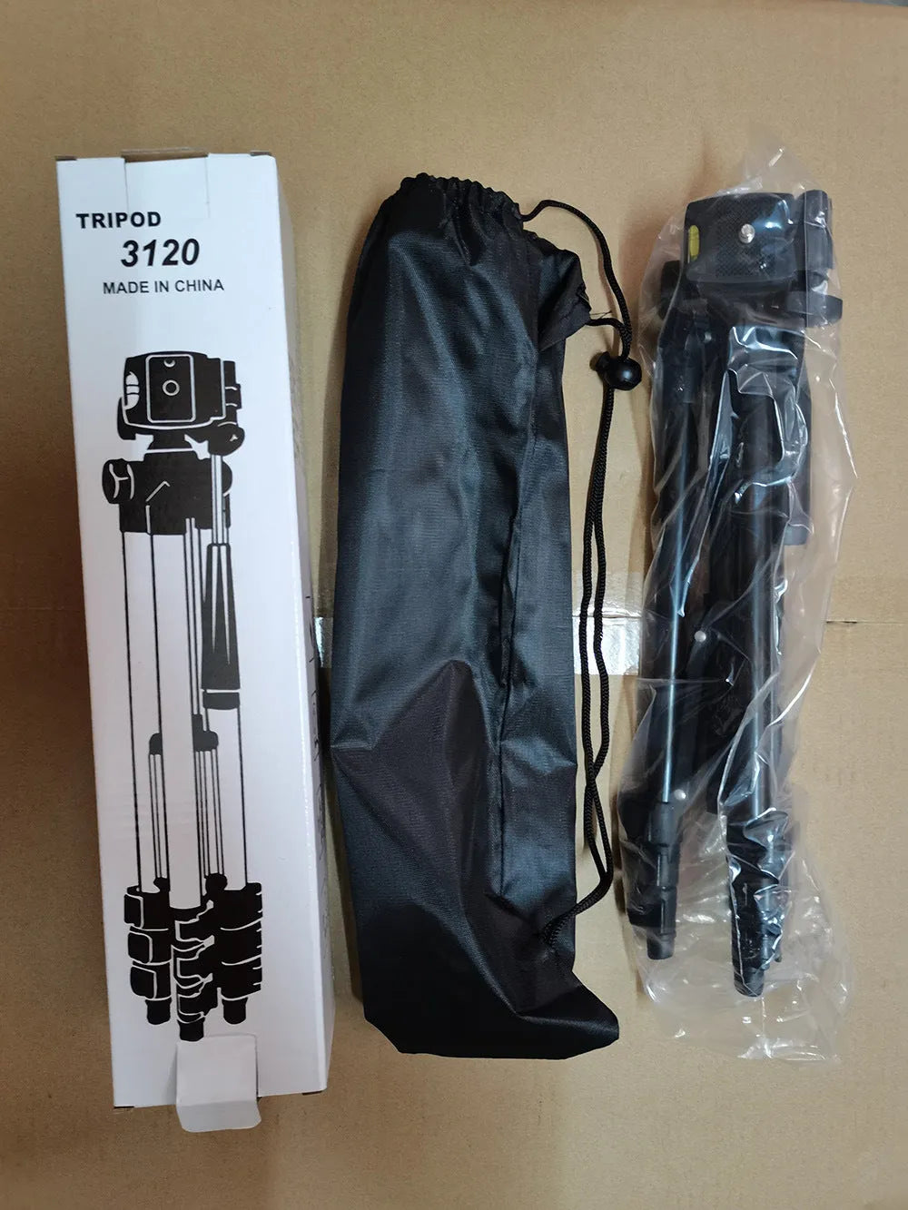 Black aluminium portable camera tripod with 4-section legs and a 3D pan head, shown at mid-height.