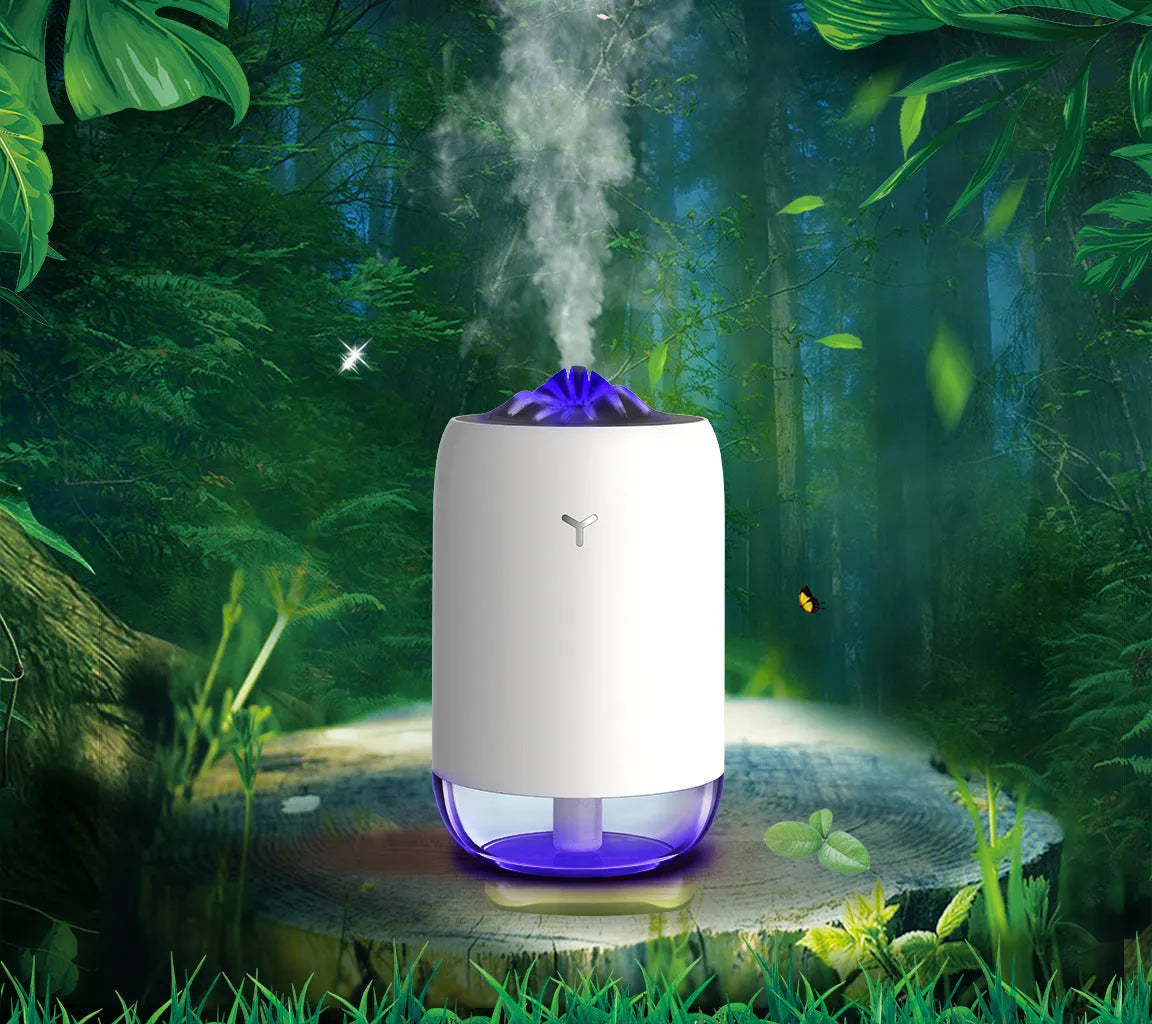 White Magic Flame columnar USB humidifier and aroma diffuser on a desk.