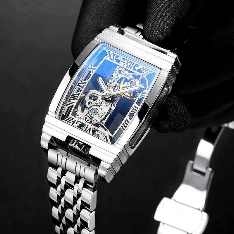Unisex square stainless steel mechanical watch with leather strap and white dial.