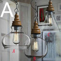 Glass wood grain single head pendant light with adjustable cord in a Nordic style.