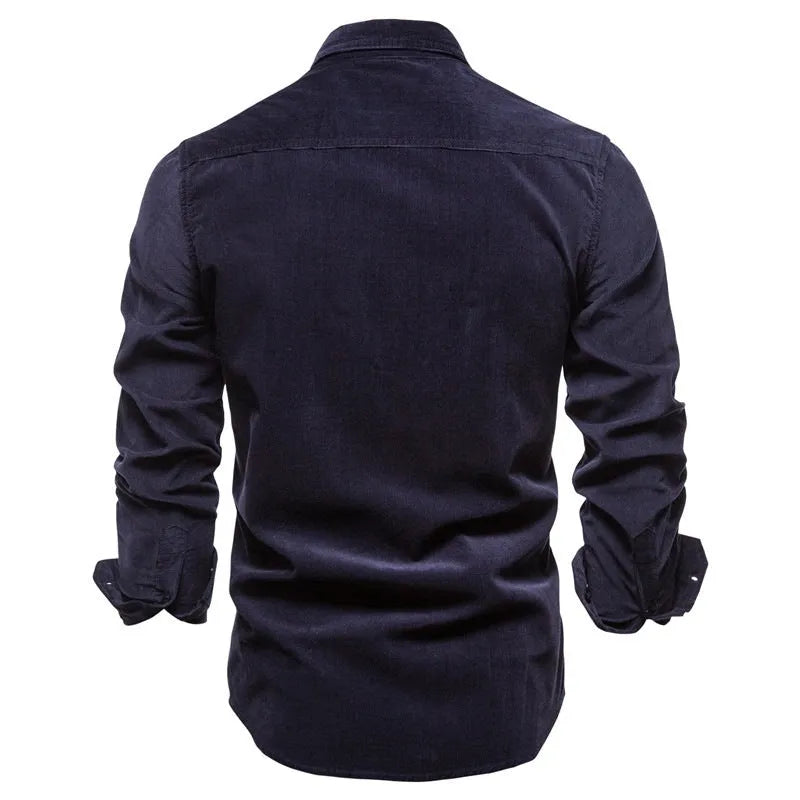 Men's denim blue linen long-sleeve casual shirt laid flat, showing button front and relaxed fit.
