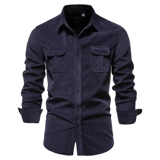Men's denim blue linen long-sleeve casual shirt laid flat, showing button front and relaxed fit.
