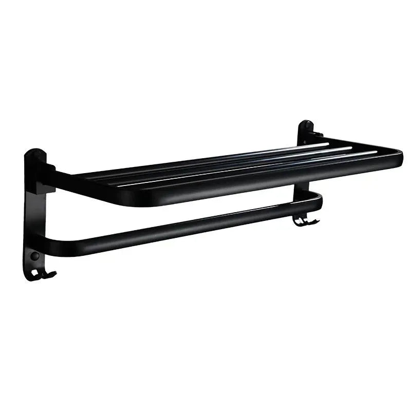 Silver anodised aluminium folding bathroom shelf with two towel racks, shown mounted on a wall.