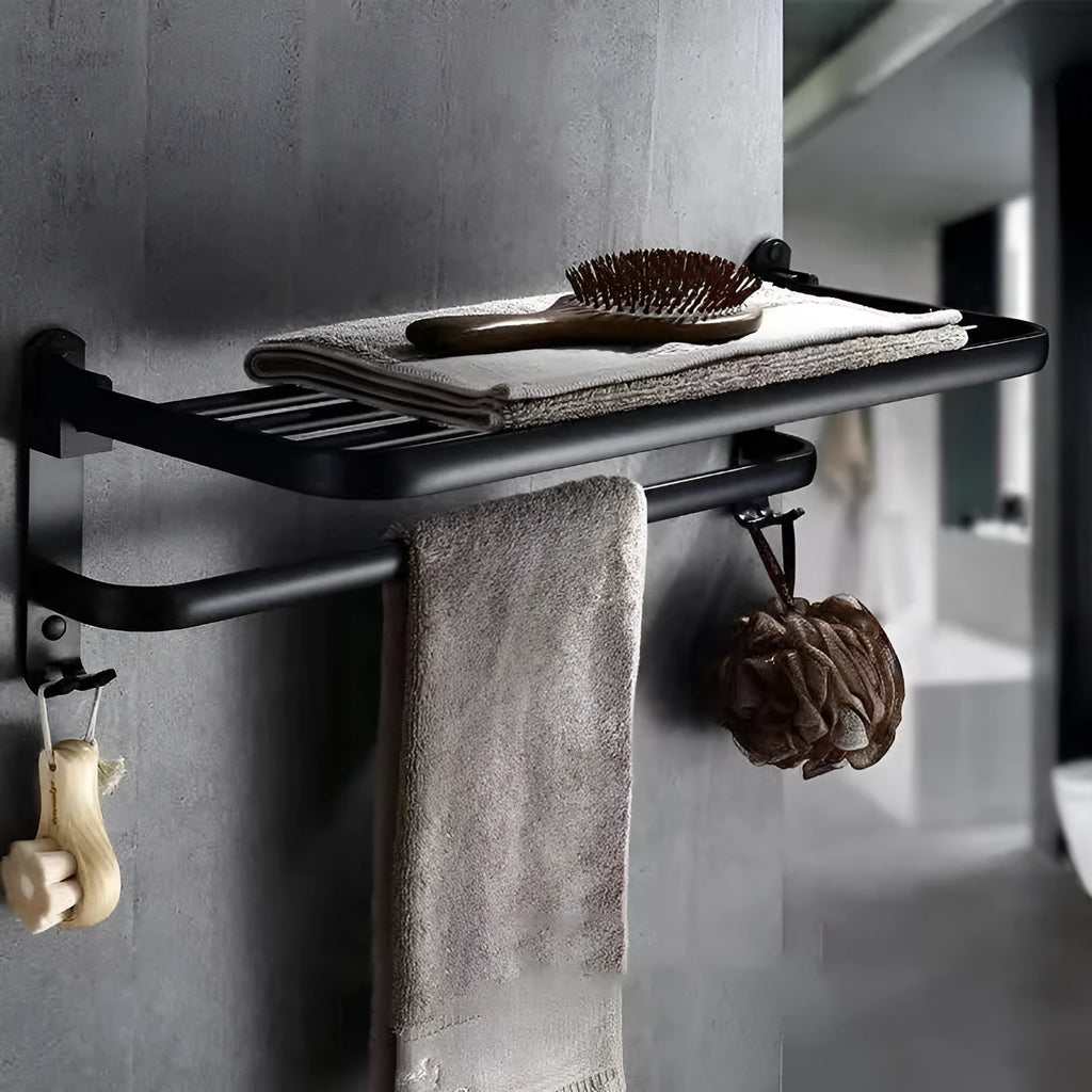 Silver anodised aluminium folding bathroom shelf with two towel racks, shown mounted on a wall.