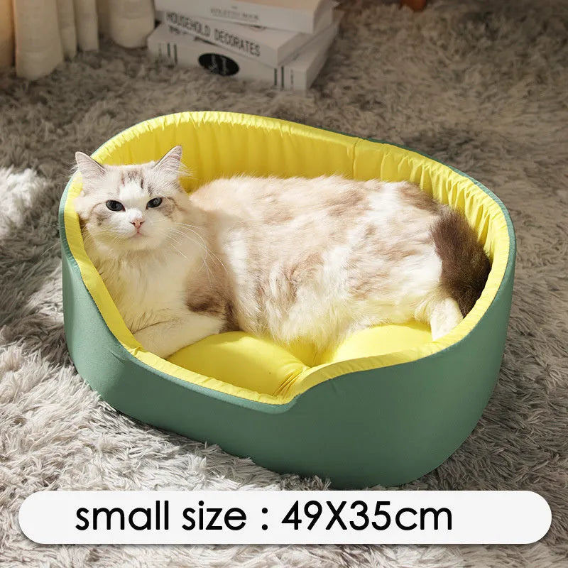 Washable cloth pet kennel for cats and dogs in green, shown in a home setting.