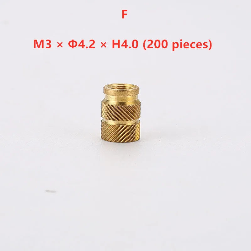 Assortment of brass hot melt copper nuts with M2 and M3 threads in various heights.