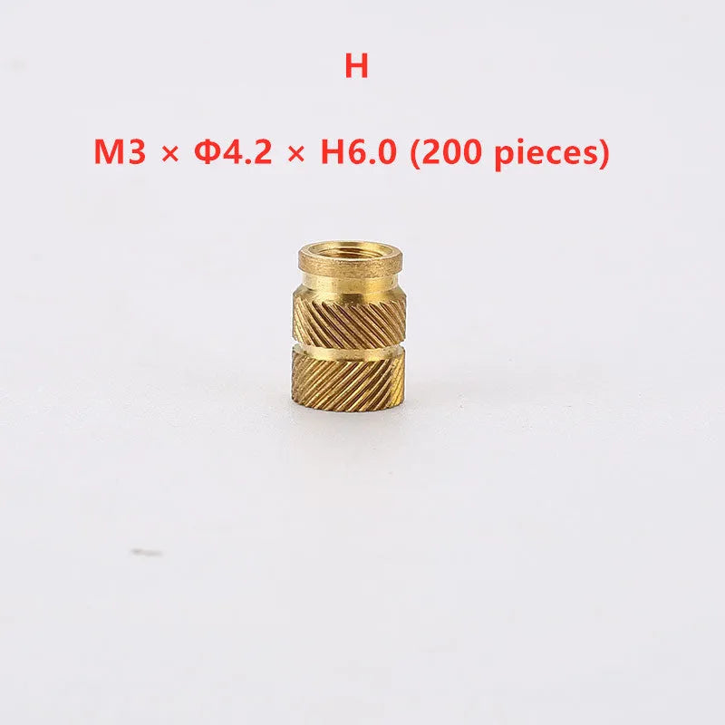 Assortment of brass hot melt copper nuts with M2 and M3 threads in various heights.