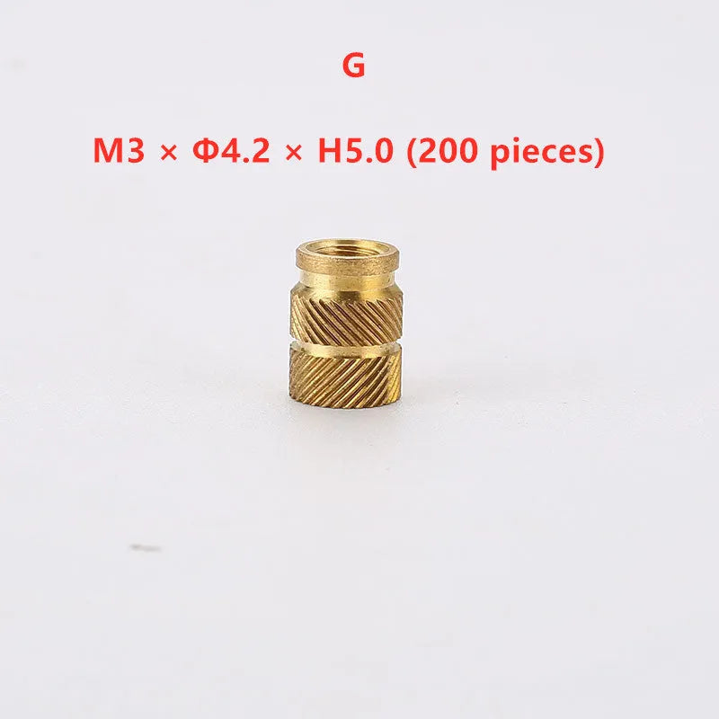 Assortment of brass hot melt copper nuts with M2 and M3 threads in various heights.