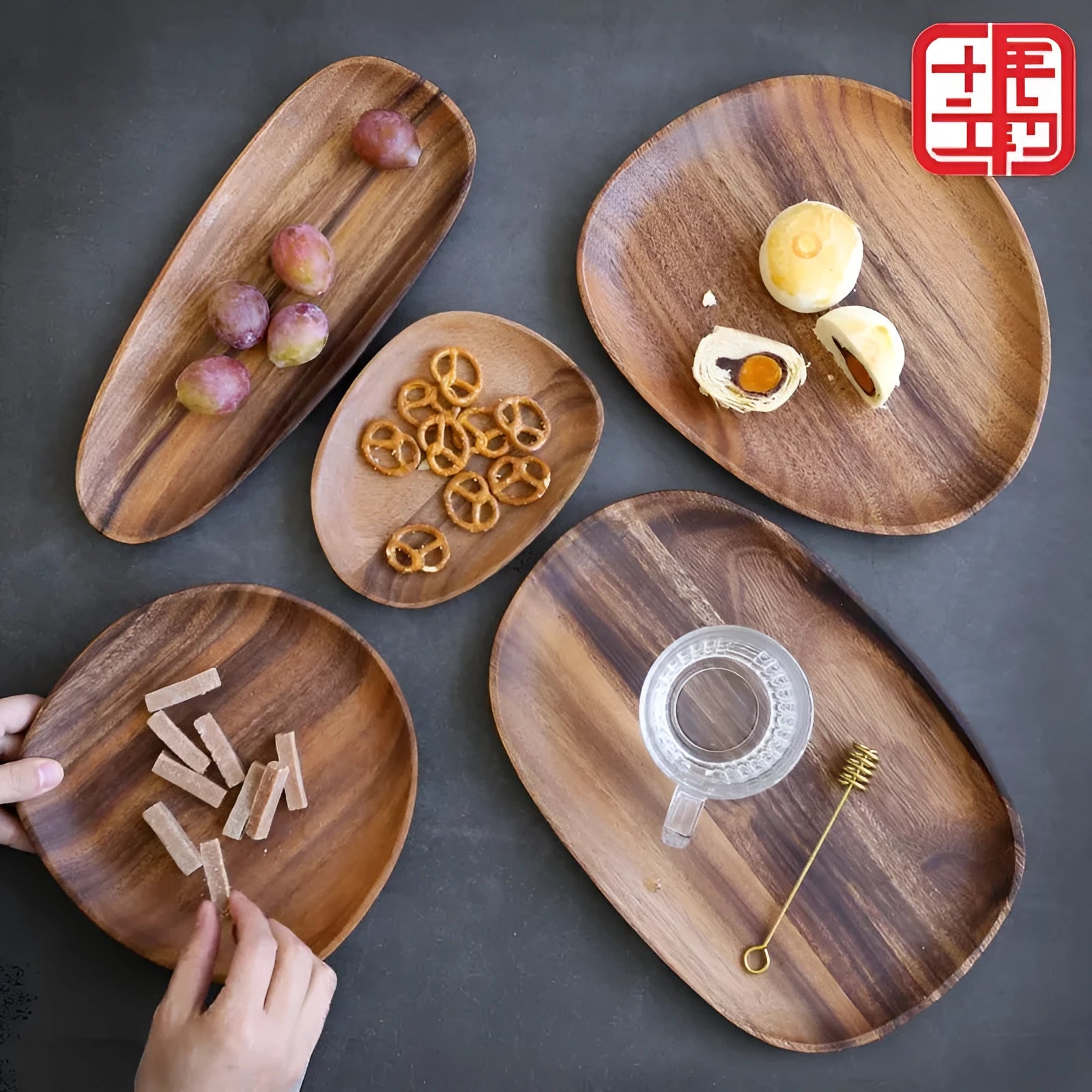 Natural acacia wood Japanese snack plate with visible wood grain patterns and hand polished surface