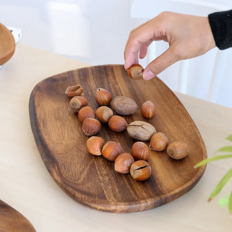 Natural acacia wood Japanese snack plate with visible wood grain patterns and hand polished surface