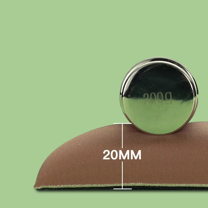 Green kiwi-shaped mouse pad with integrated wrist support and printed calculator numbers on cloth surface.