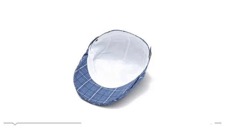 Cotton peaked cap with grid pattern, short brim, and tapered top in navy blue