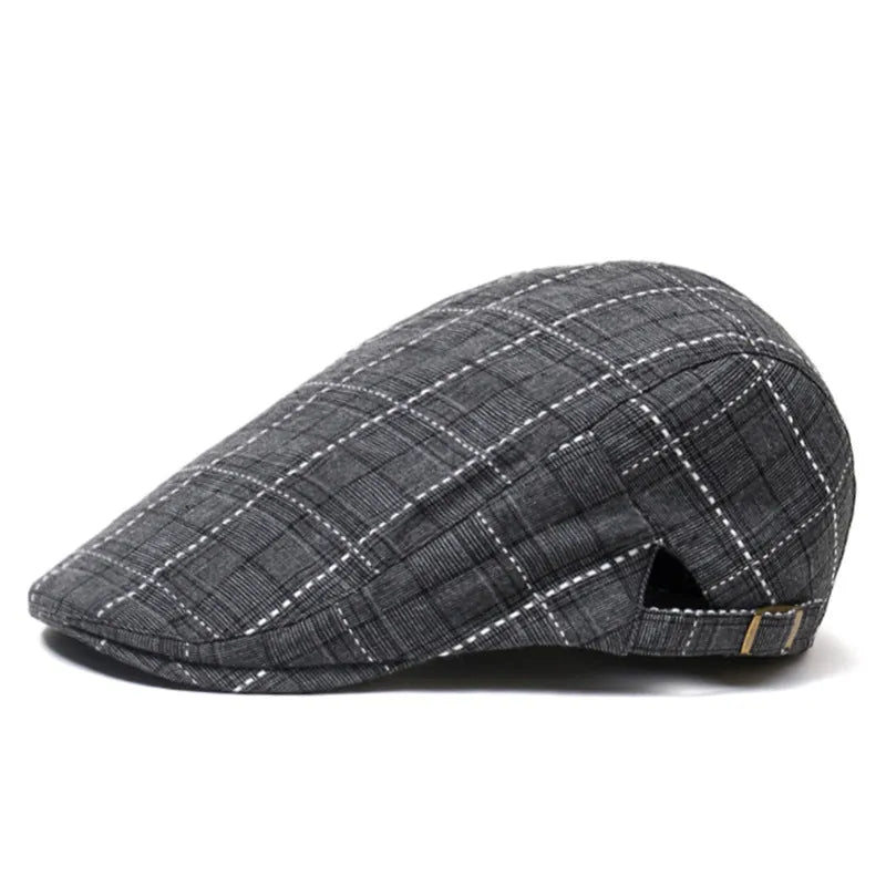 Cotton peaked cap with grid pattern, short brim, and tapered top in navy blue