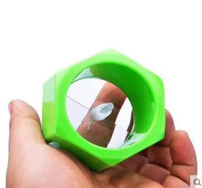Yellow and green ABS plastic spiral vegetable cutter for kitchen use