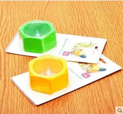 Yellow and green ABS plastic spiral vegetable cutter for kitchen use