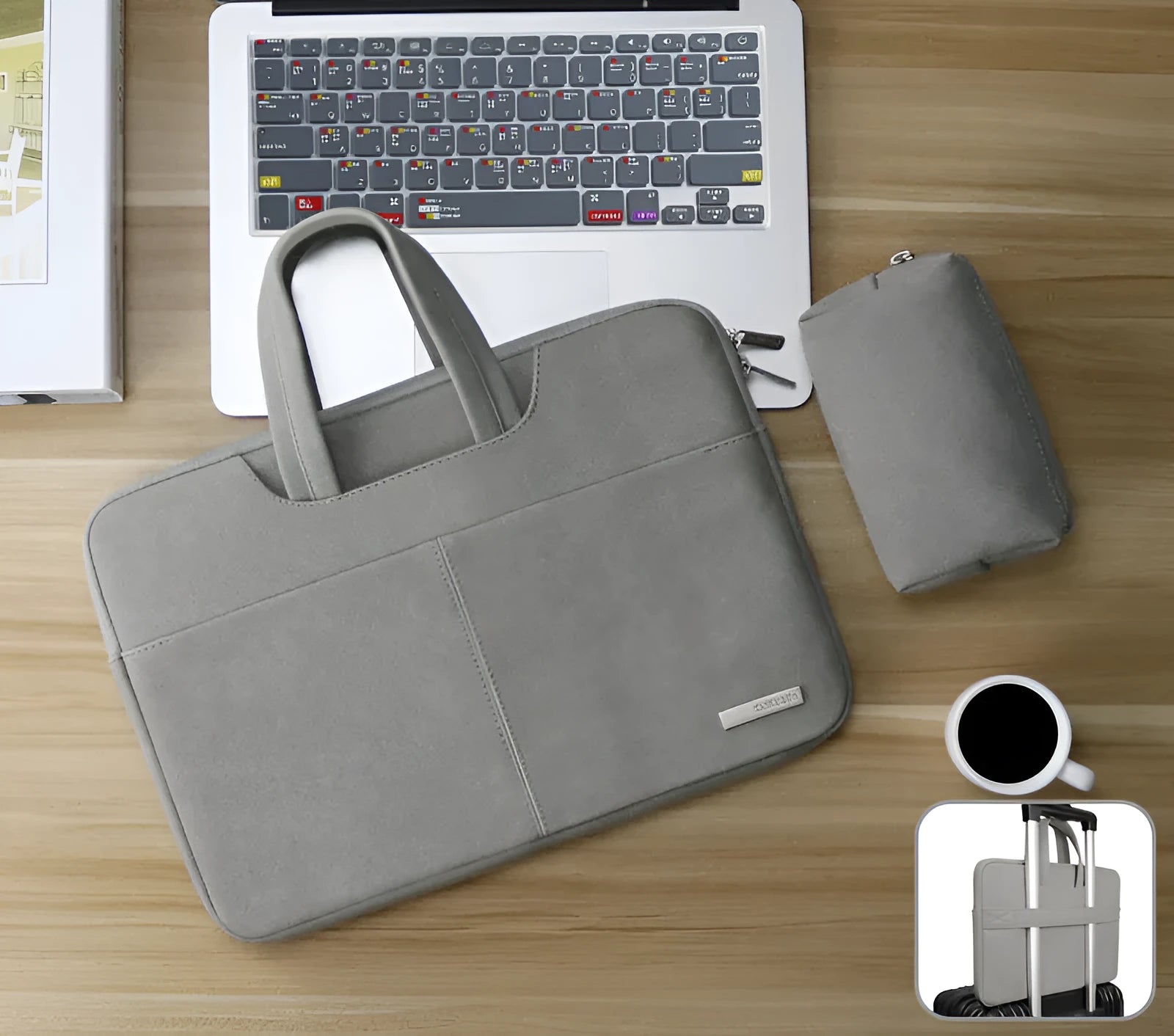 Blue PU leather laptop shoulder bag open to show internal padded computer pocket and organising compartments.