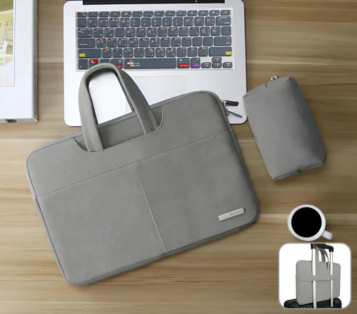 Blue PU leather laptop shoulder bag open to show internal padded computer pocket and organising compartments.