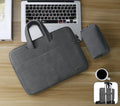 Blue PU leather laptop shoulder bag open to show internal padded computer pocket and organising compartments.