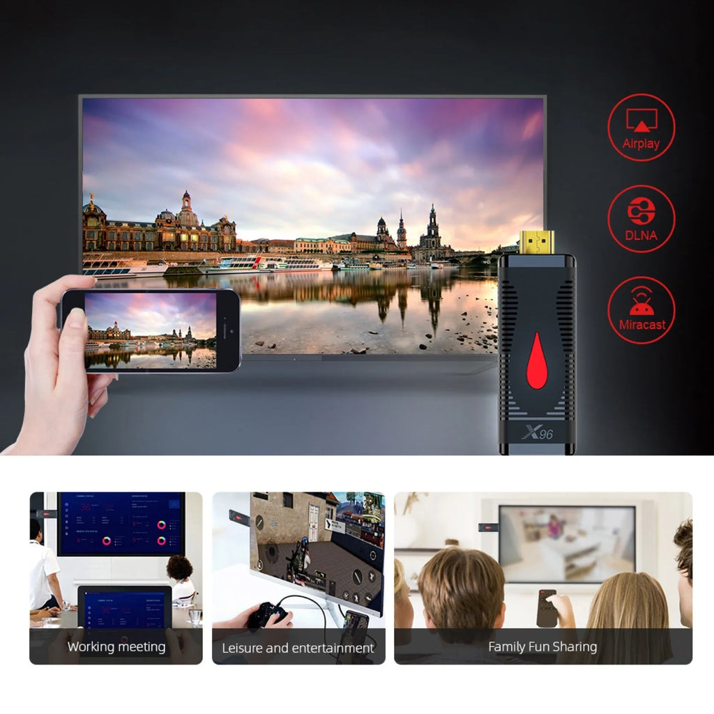 Smart network TV set-top box stick dongle with remote control and power supply on table