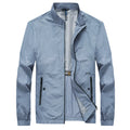 Kentino men's thin blue summer city shirt made from 100% polyester on a hanger.