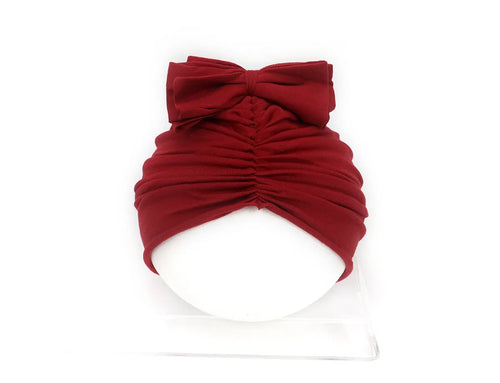 Soft knitted acrylic baby girl turban hat in solid colour, fits head sizes 35-48cm for ages 0-28 months