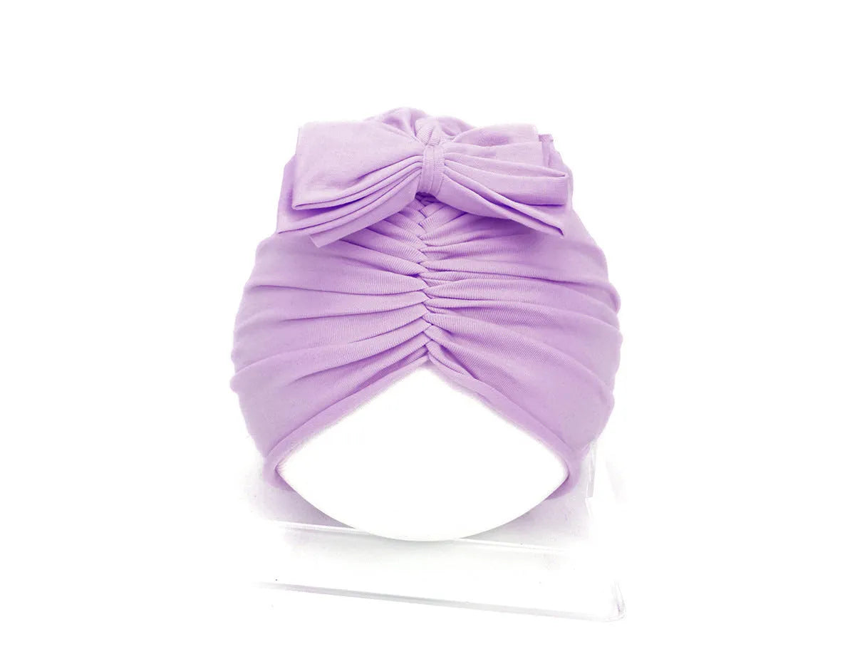 Soft knitted acrylic baby girl turban hat in solid colour, fits head sizes 35-48cm for ages 0-28 months