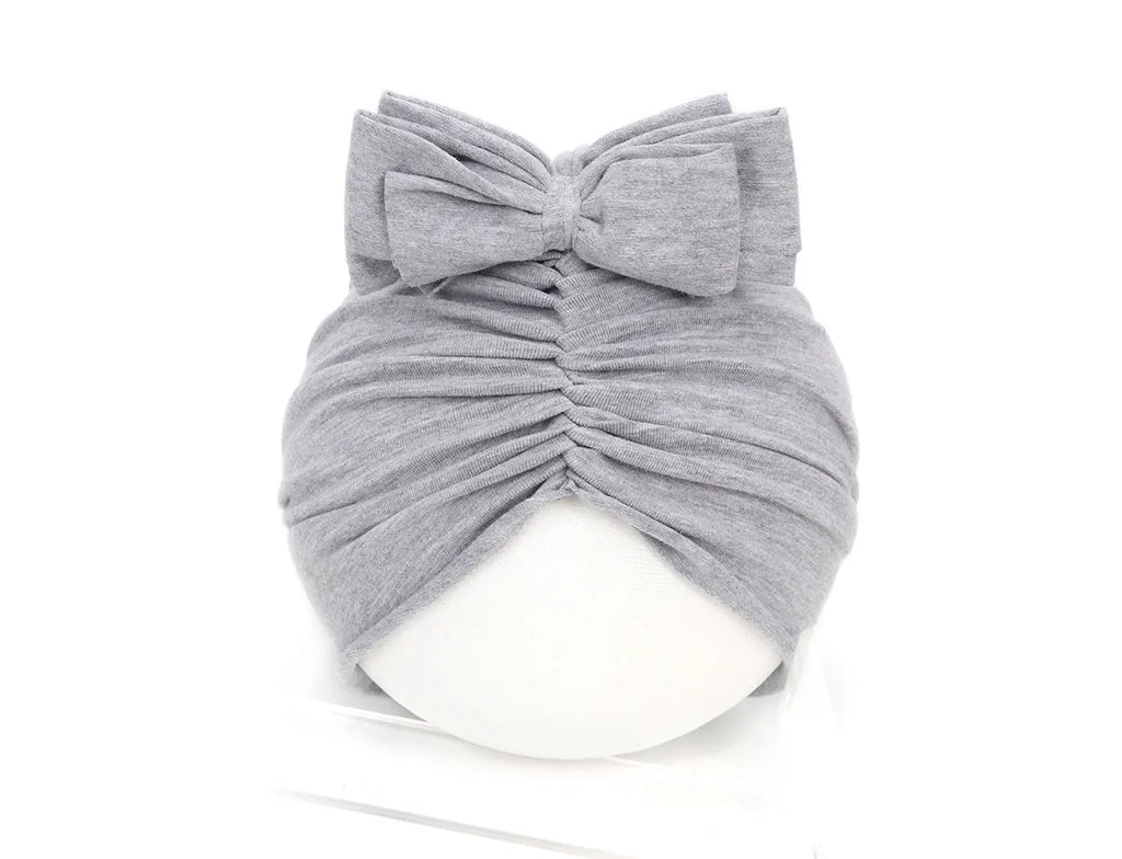 Soft knitted acrylic baby girl turban hat in solid colour, fits head sizes 35-48cm for ages 0-28 months
